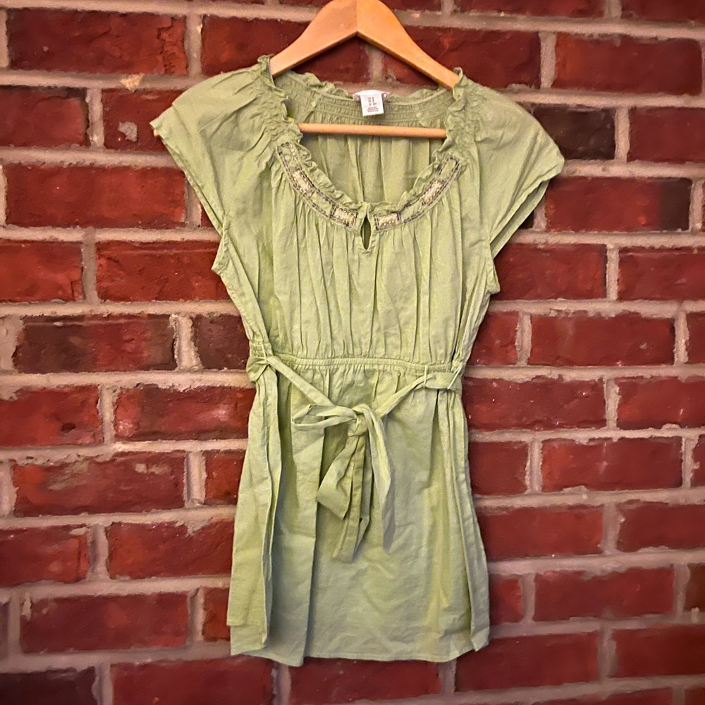 Motherhood Maternity blouse in lime green with delicate accents at neckline